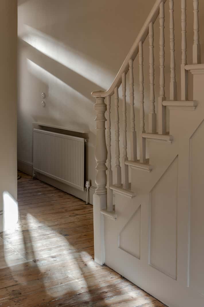 Natural Materials and Period Features in a Restored Victorian House 13 hall staircase rustic wooden floorboards