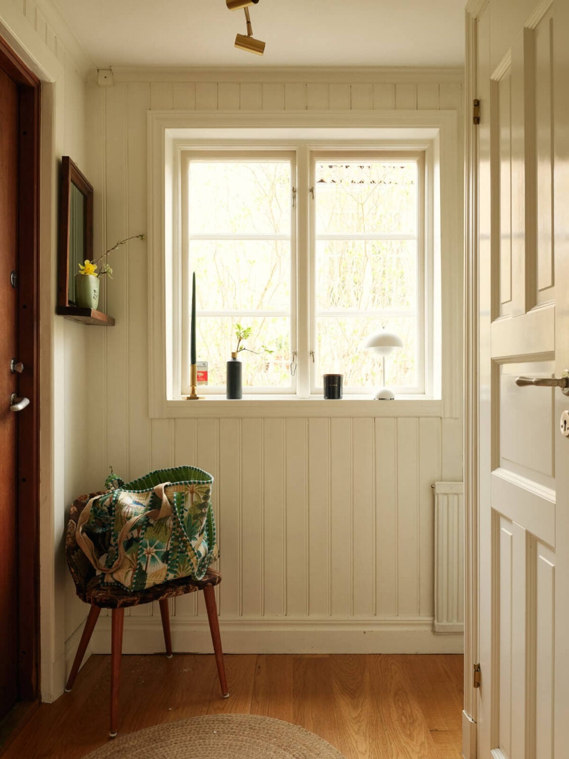 A Charming Semi-Detached House in the First Garden Town of Stockholm 18 hall tongue and groove paneling