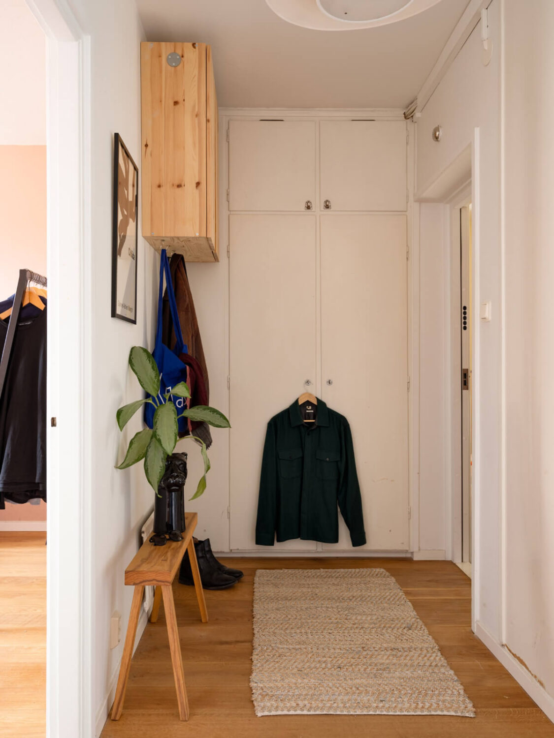 Color Accents in a Renovated Midcentury Apartment in Stockholm 22 hall with built in wardrobes Color Accents in a Renovated Midcentury Apartment in Stockholm