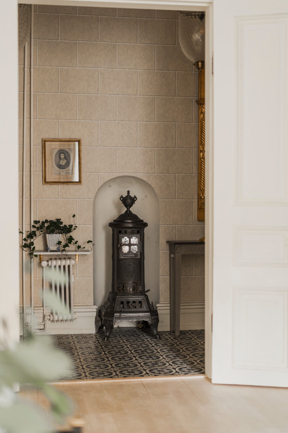 A Spectacular Kitchen and Antiques in a Late 19th-Century Apartment 17 hall with fireplace