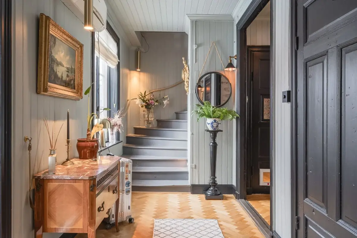 A Cozy Country House in Sweden Filled with Wallpapers 31 hall with parquet floor staircase