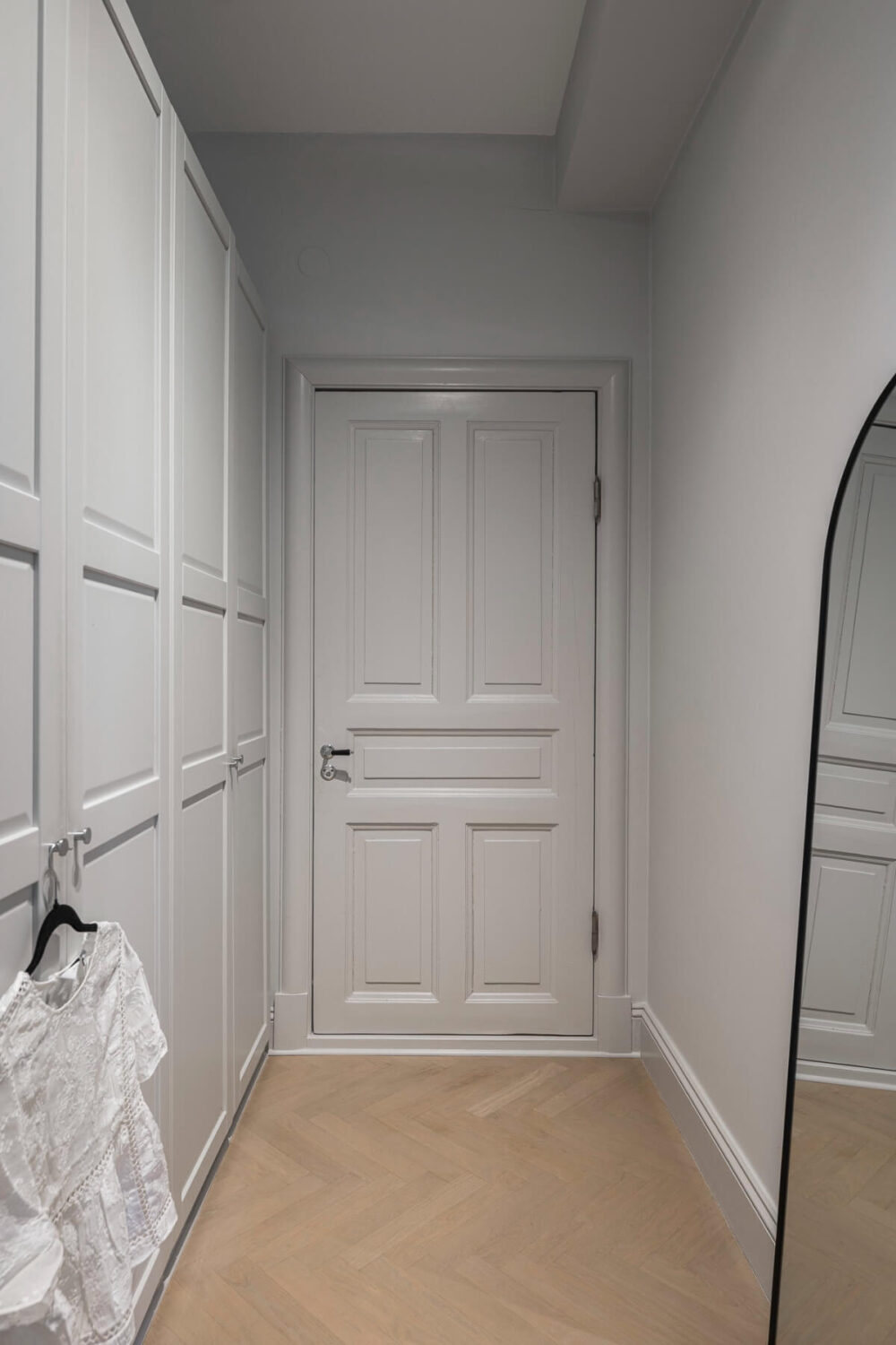 A Stylish Swedish Studio Apartment with a Blue Kitchen 20 hall with wardrobes