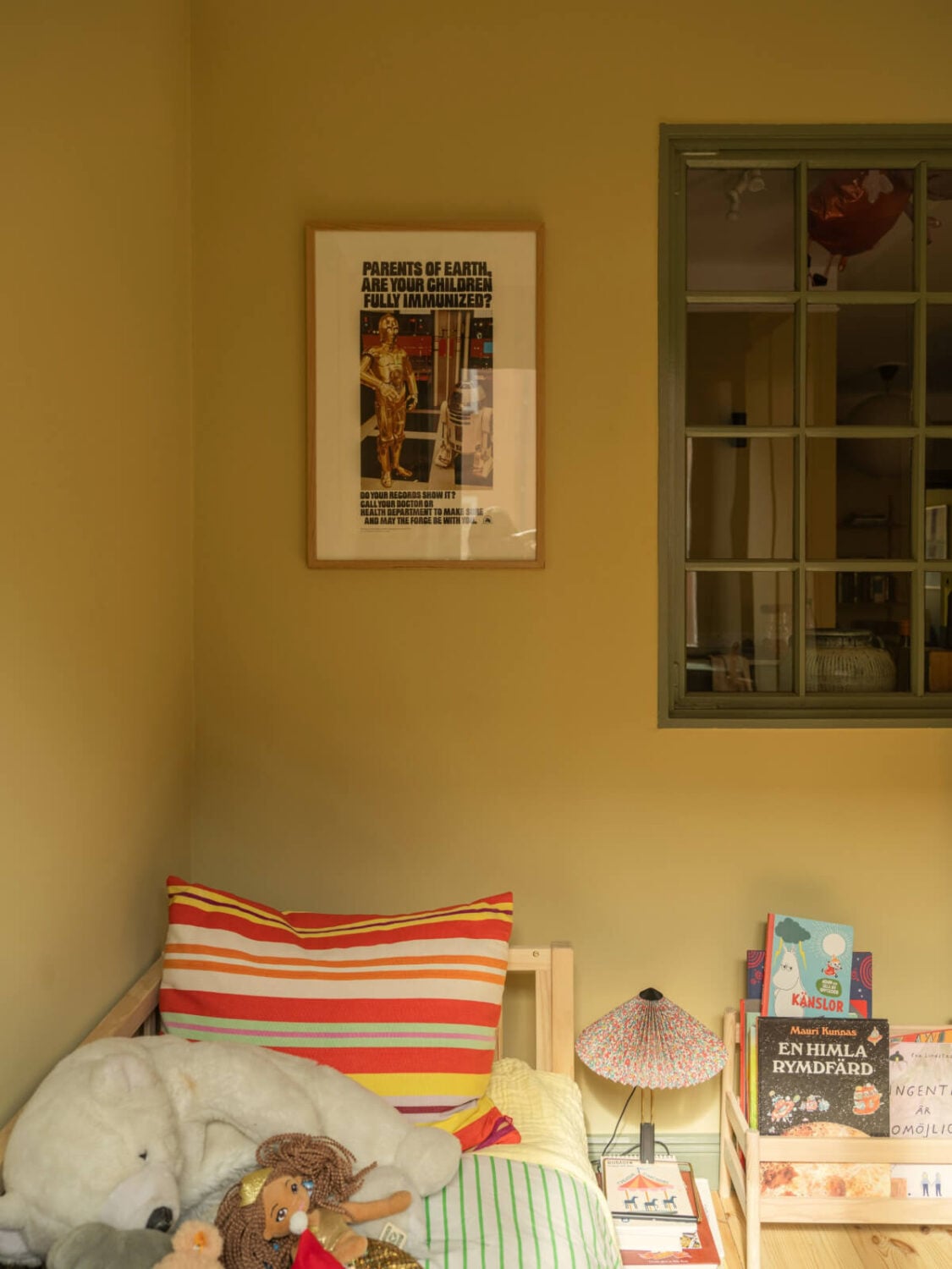 A Yellow and Green Color Palette in a Modern Swedish Apartment 13 kids bedroom indoor window
