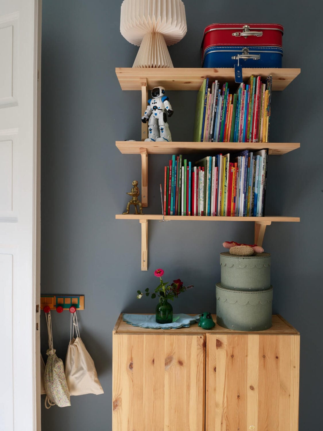 A Nature-Inspired Color Palette in a Stockholm Apartment 21 kids bedroom wooden shelves