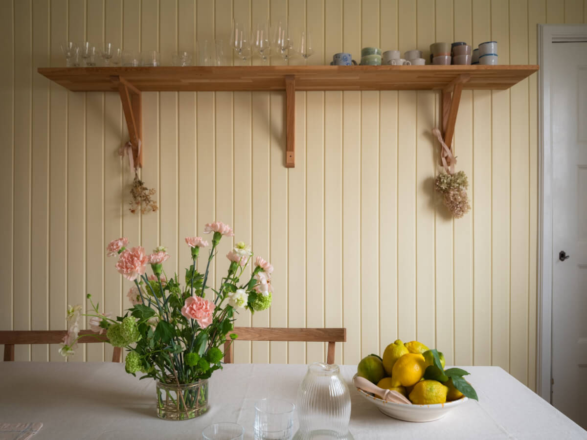 A Soft Color Palette and a Charming Kitchen in a Swedish Apartment 7 kitchen butter yellow walls