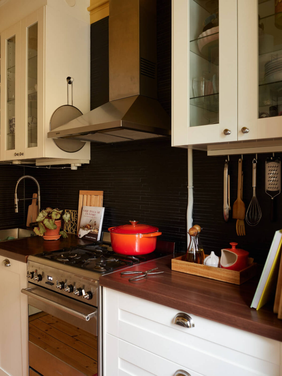 A Colorful Studio Apartment with Smart Storage and A Cozy Bed Niche 15 kitchen detail