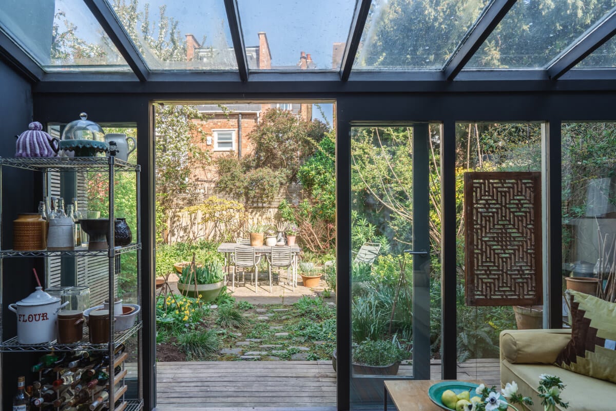 An Edwardian House with Muted Tones, Natural Materials, and a Landscaped Garden 12 kitchen extension garden