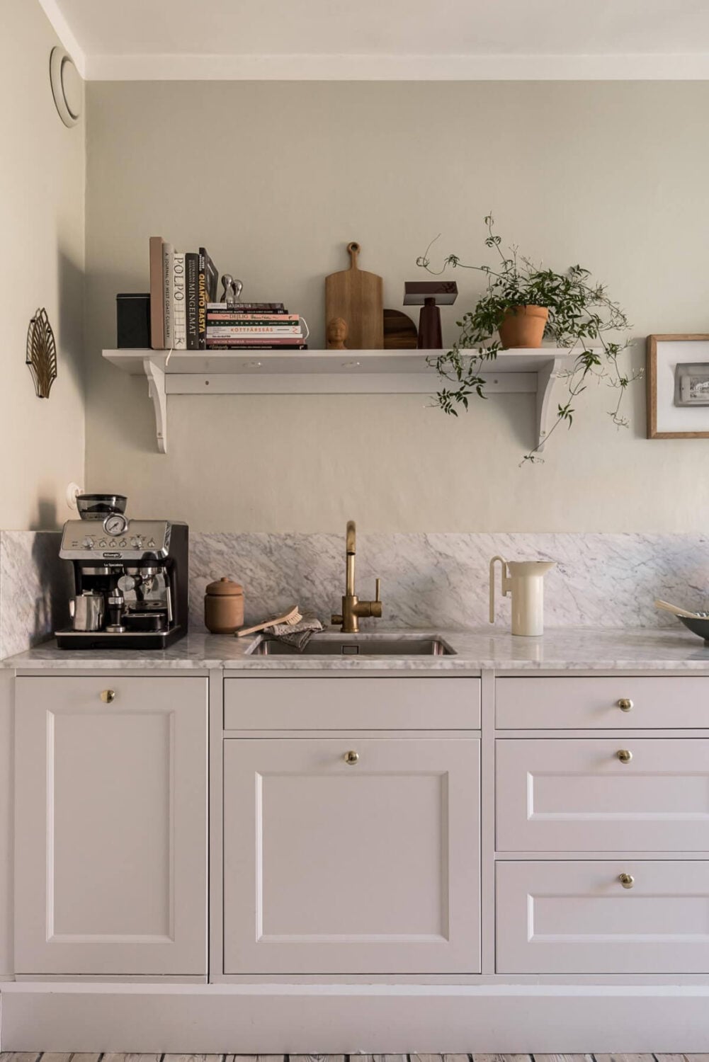 Gray Tones and a Classic Kitchen in a Swedish Apartment 19 kitchen marble countertop shelf