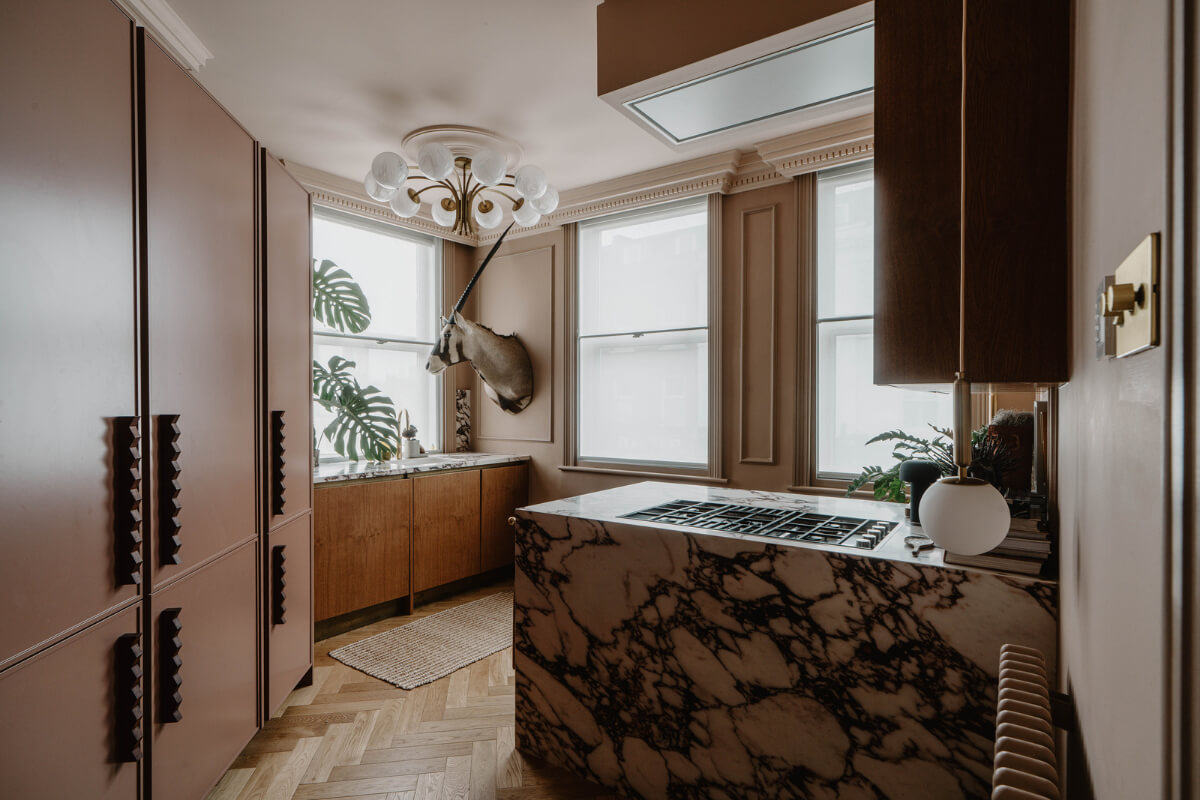 A Classy Apartment on the Top Floors of a 19th-Century Building 5 kitchen marble countertops