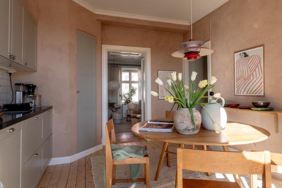 A Natural Color Palette, Period Features, & Grand Rooms in a Swedish Home 29 kitchen plaster walls wooden dining table