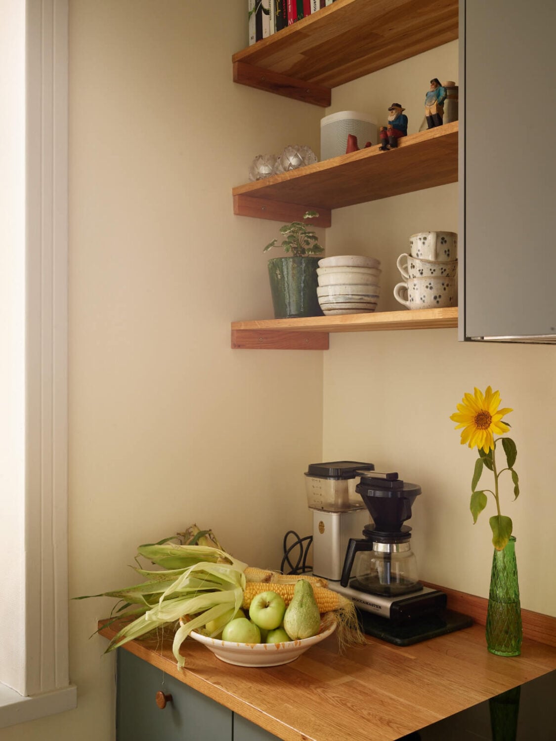 A Nature-Inspired Color Palette in a Stockholm Apartment 12 kitchen shelves