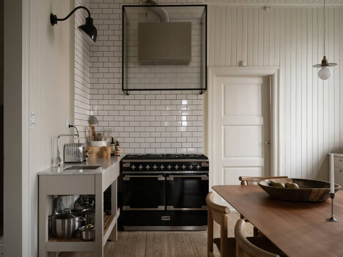 Artilleriet Co-Founder is Selling Her Art Nouveau Villa in Sweden 4 kitchen tongue and groove paneling white subway tiles