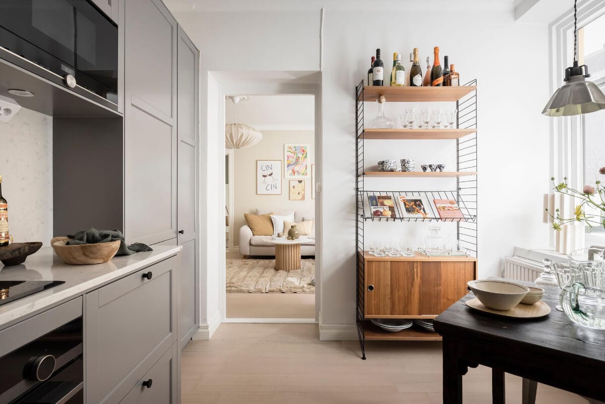 A Bright One-Bedroom Apartment with a Large Balcony 18 kitchen view into living room