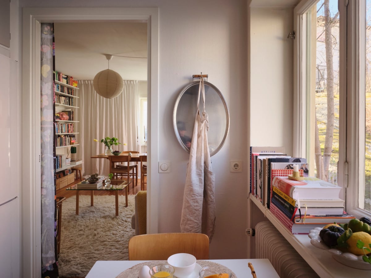 A Light-Filled Functionalist Apartment in Stockholm 11 kitchen view into living room