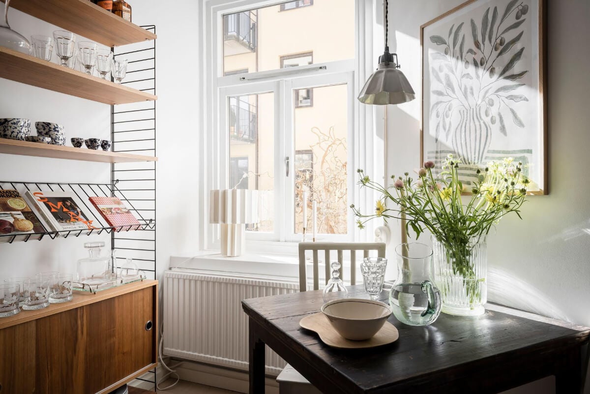 A Bright One-Bedroom Apartment with a Large Balcony 17 kitchen window string shelves cabinet