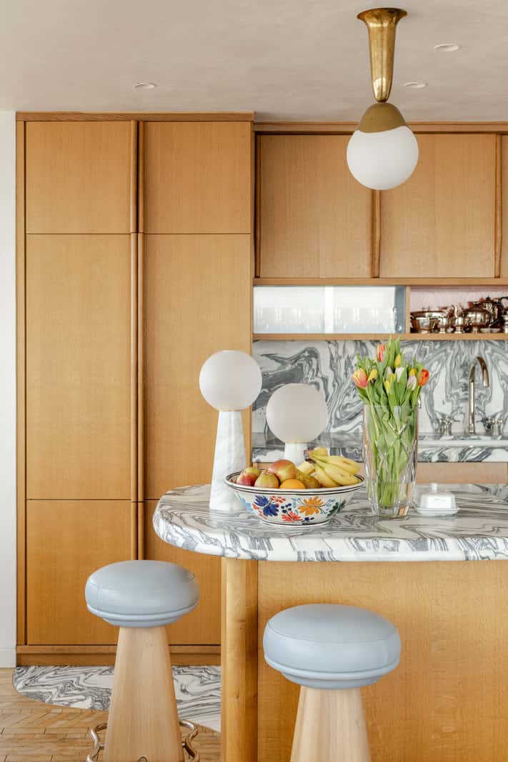 Oak and Marble in a Spectacular Brutalist Apartment in London 9 kitchen with breakfast br