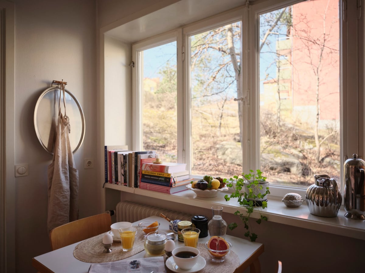 A Light-Filled Functionalist Apartment in Stockholm 10 large kitchen window