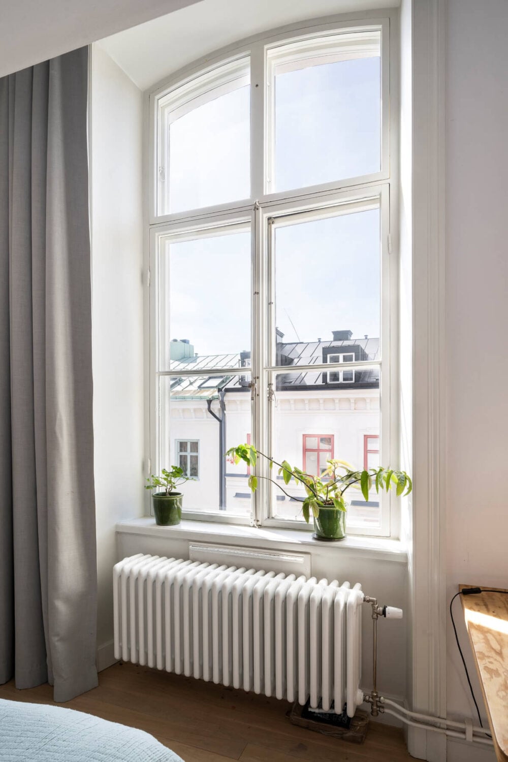 Pale Blue Walls and Huge Windows in a Swedish Loft Apartment 17 large window loft bedroom