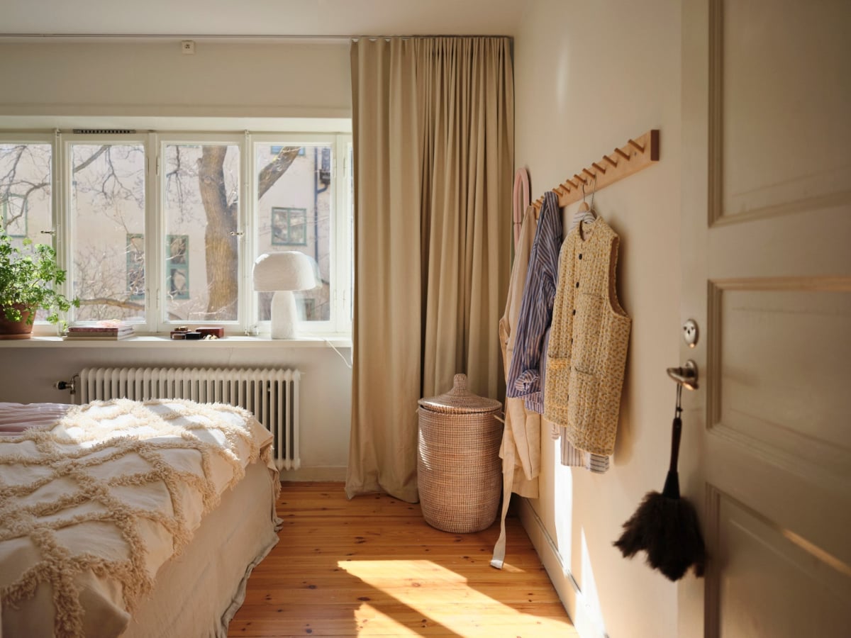 A Light-Filled Functionalist Apartment in Stockholm 12 light filled bedroom wooden floor
