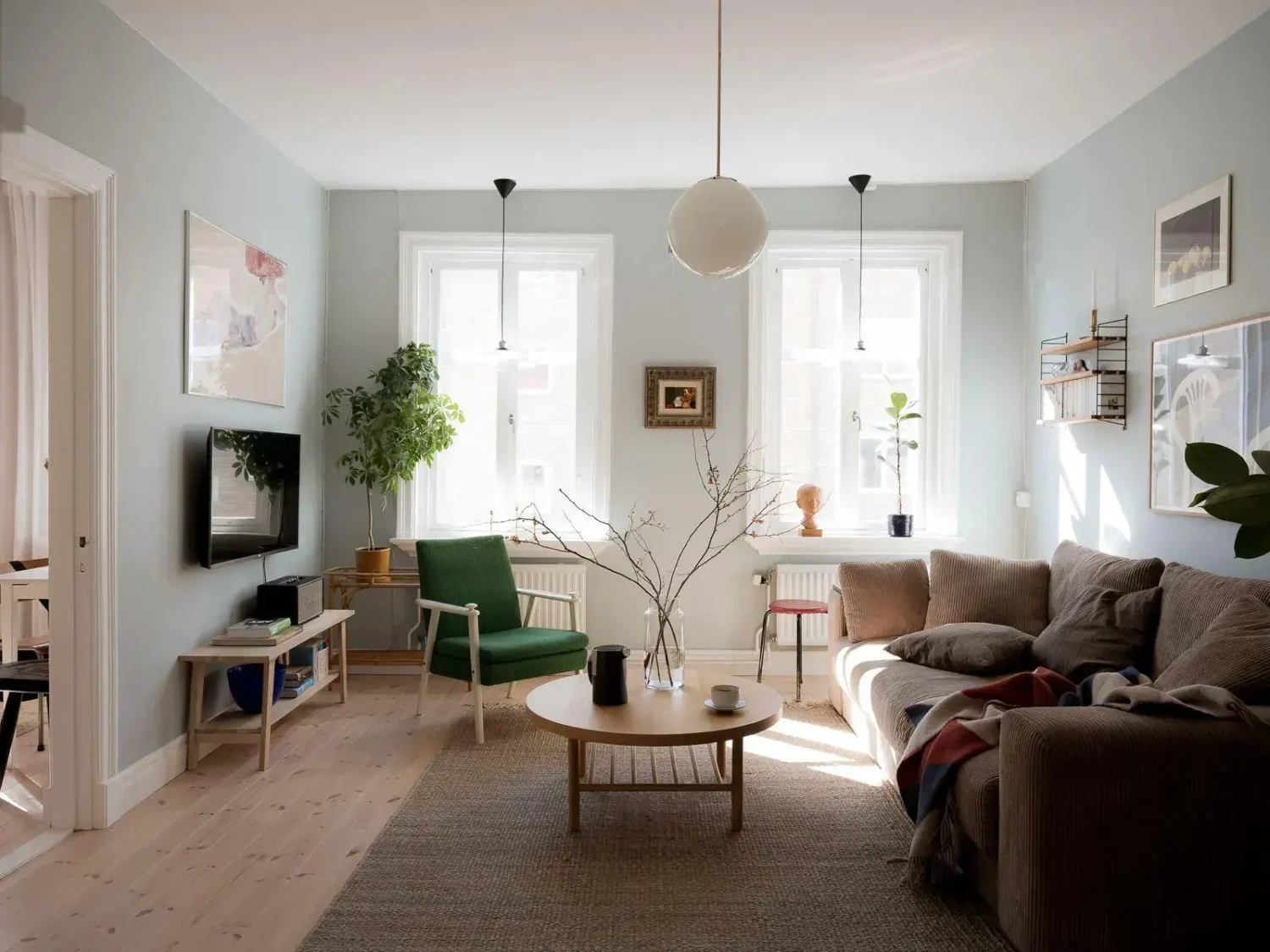 Gray Walls in a Renovated 19th-Century Gothenburg Apartment 1 light-filled scandinavian living room