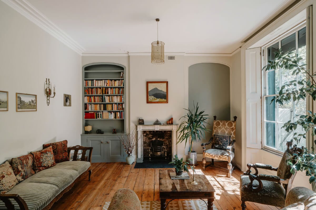 A Grand Regency-Style House with a Mature Garden in London 4 living room arched niche with bookshelves fireplace wooden floorboards