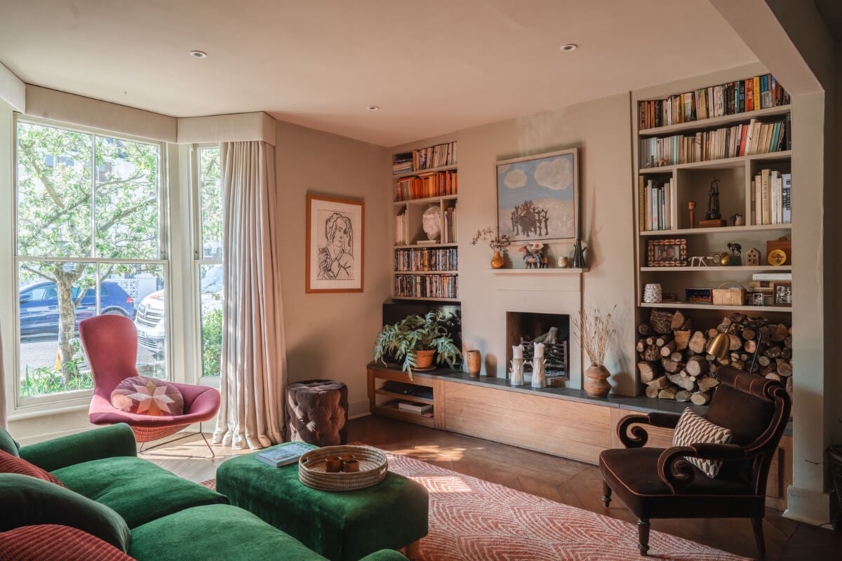 An Edwardian House with Muted Tones, Natural Materials, and a Landscaped Garden 1 living room bay window built-in bookshelves