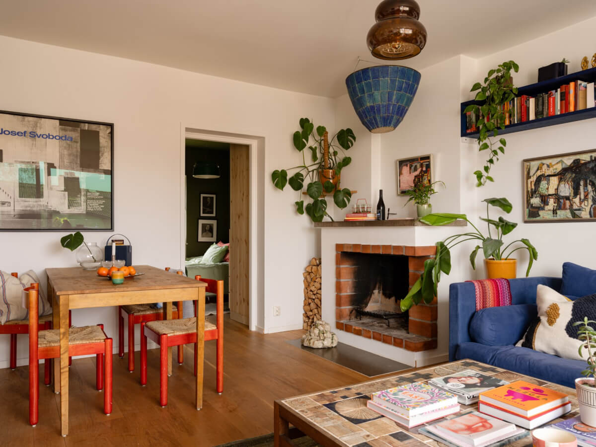 Color Accents in a Renovated Midcentury Apartment in Stockholm 9 living room brick fireplace