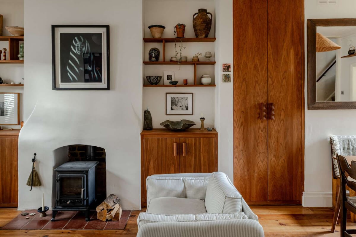 Reclaimed Materials and Custom Storage in a Serene London Home 3 living room built in storage