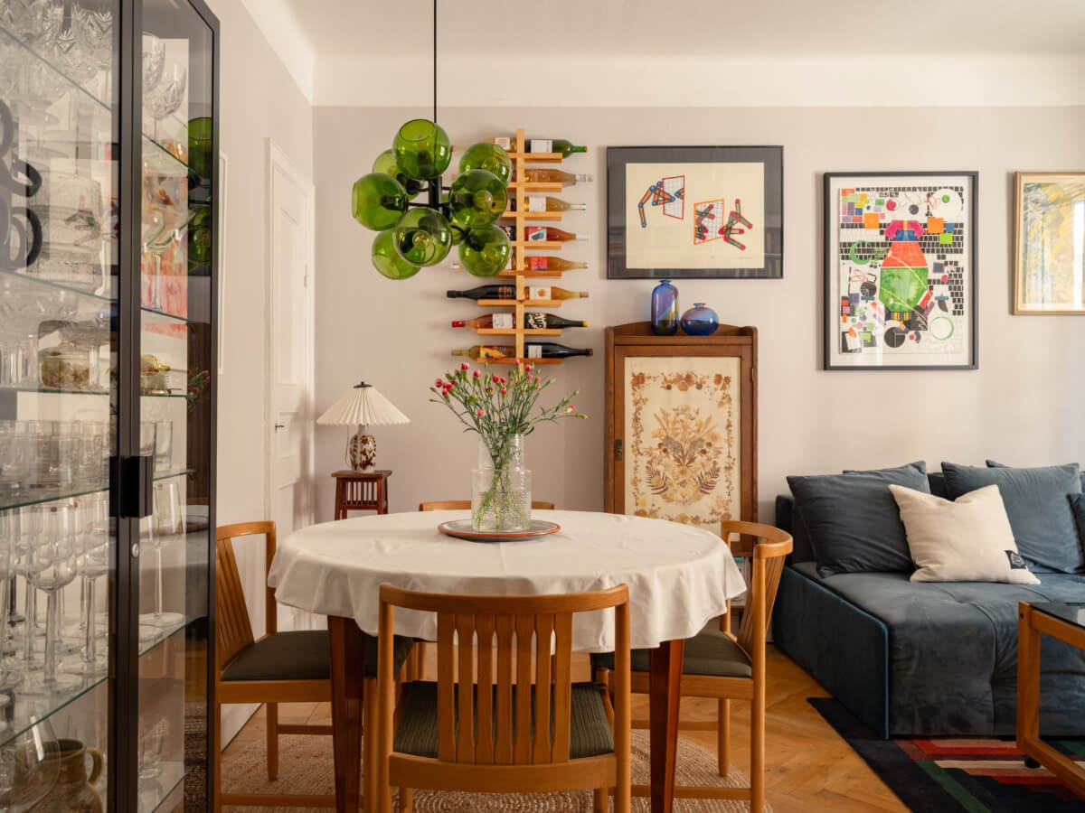 A Small, Cozy Apartment with Built-in Storage and Bookshelves 8 living room herringbone floor dining table