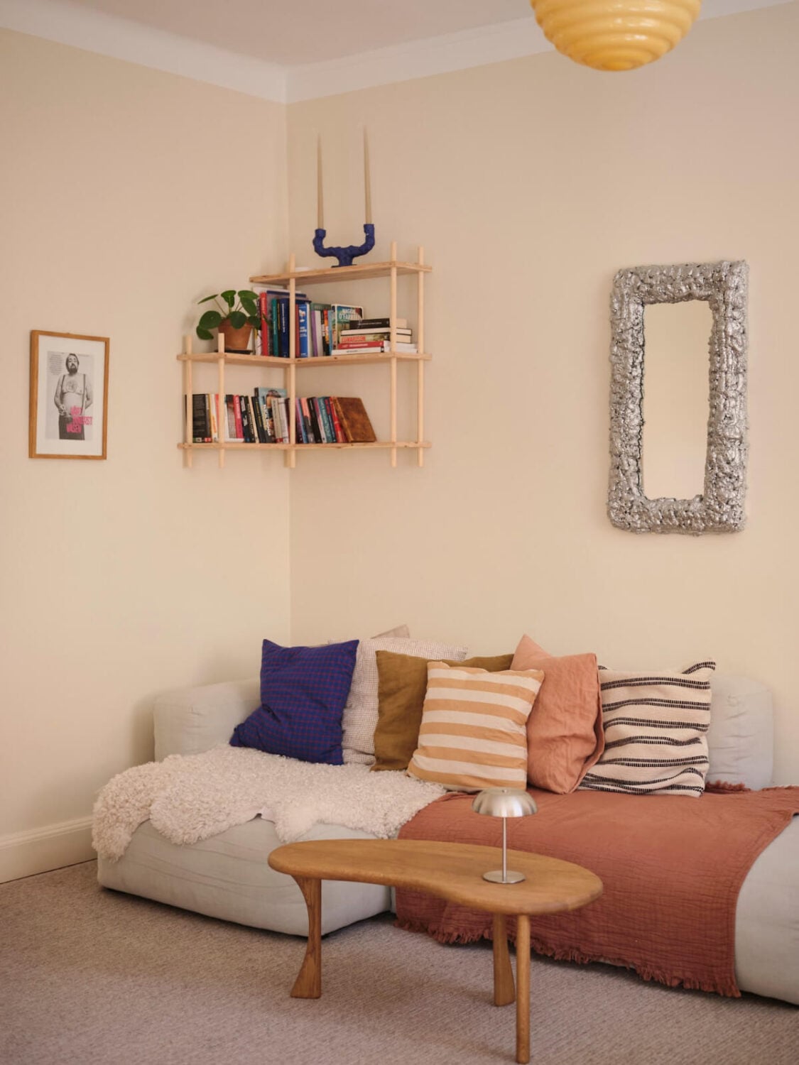 Warm, Natural Light in a Renovated Turn-of-the-Century Apartment 6 living room sofa corner shelves