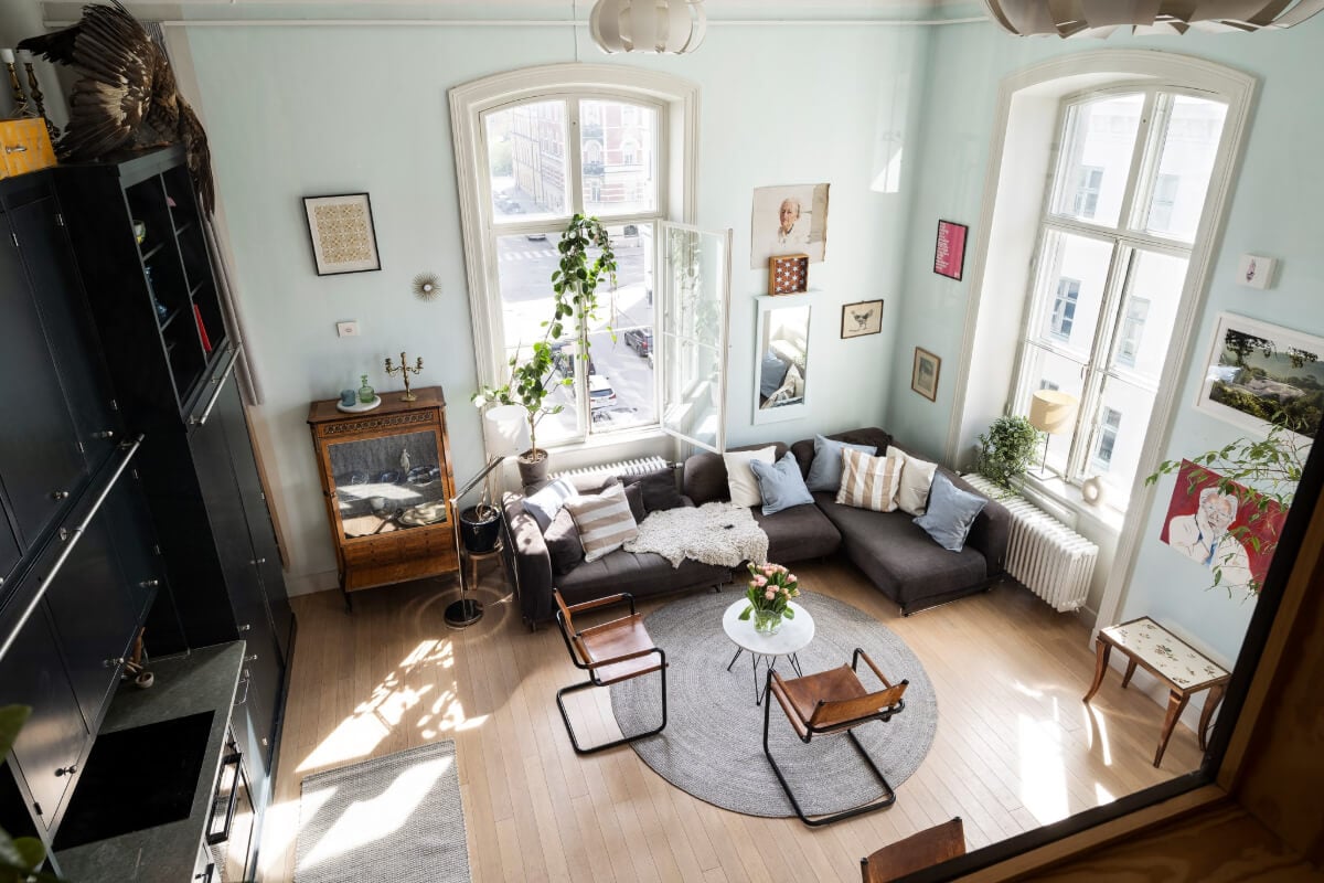 Pale Blue Walls and Huge Windows in a Swedish Loft Apartment 2 loft aparment living space from above