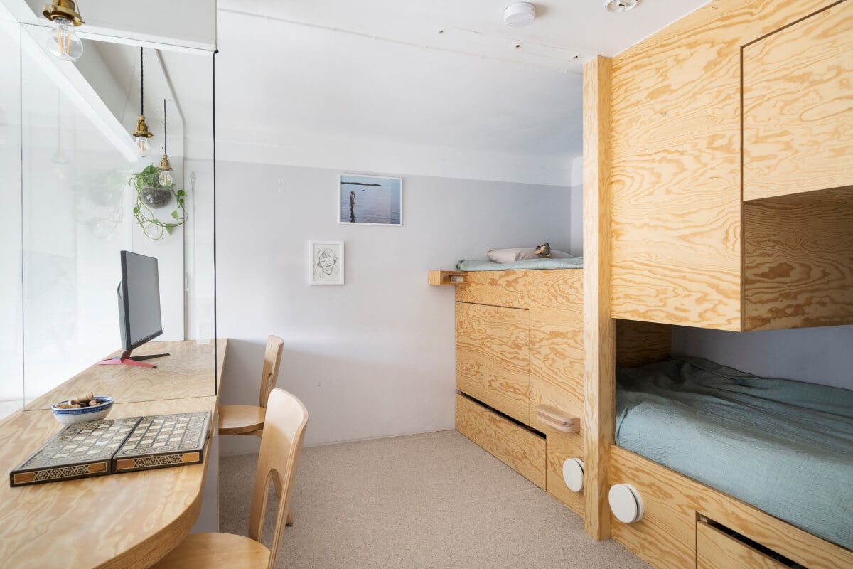 Pale Blue Walls and Huge Windows in a Swedish Loft Apartment 19 loft bedroom home office bunk beds