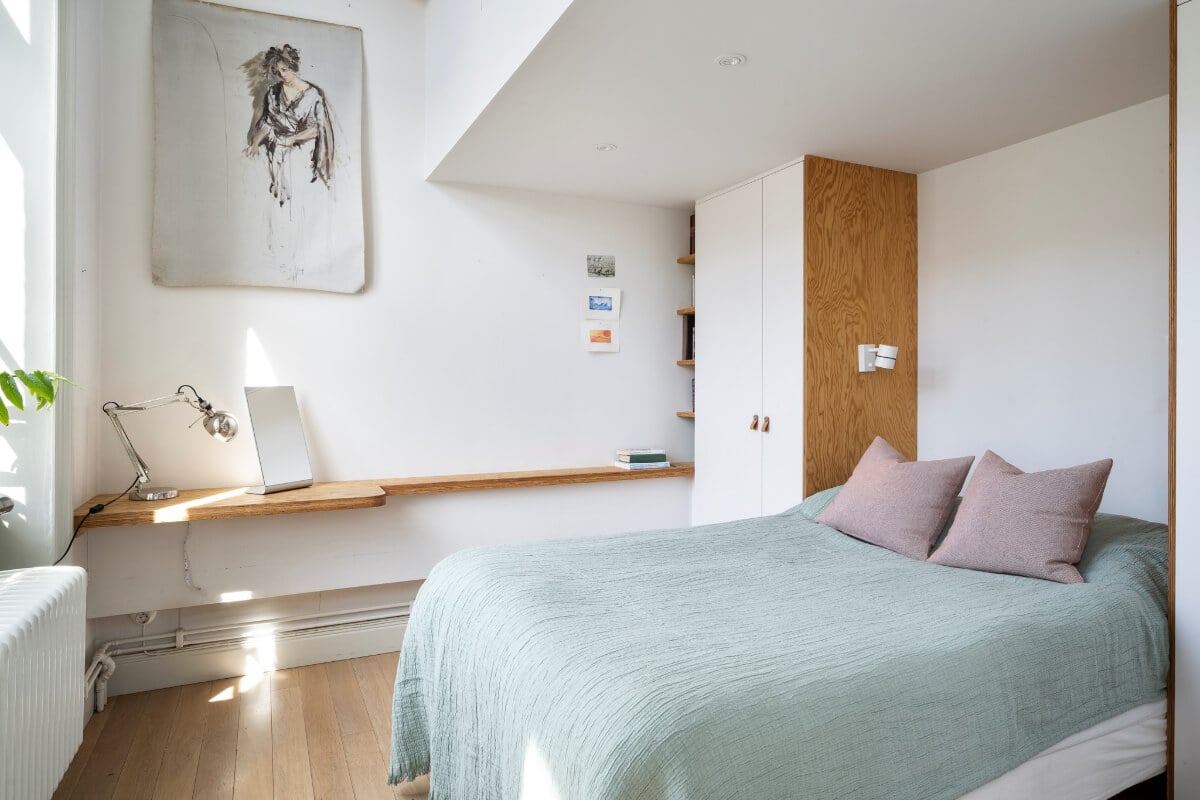Pale Blue Walls and Huge Windows in a Swedish Loft Apartment 15 loft bedroom