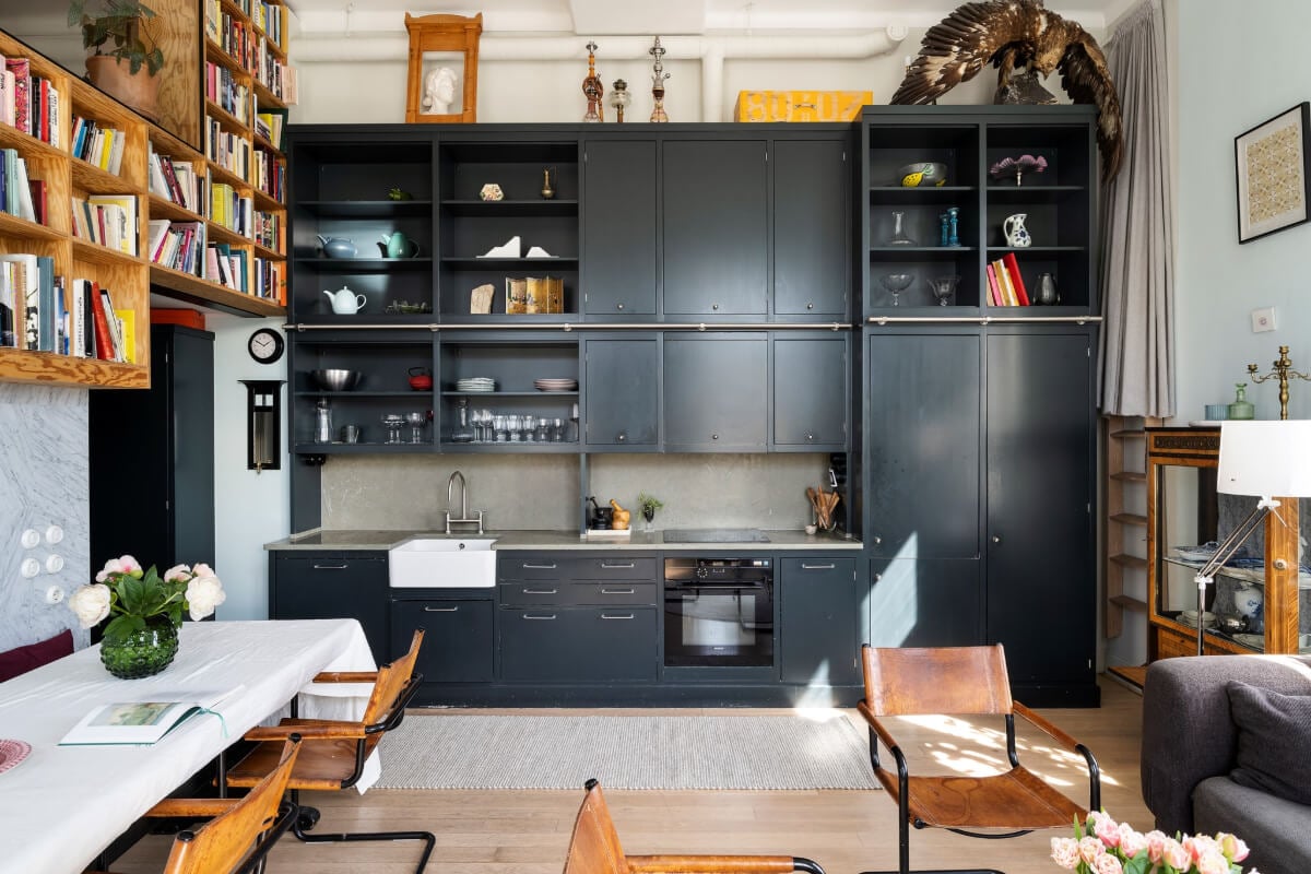 Pale Blue Walls and Huge Windows in a Swedish Loft Apartment 6 loft kitchen double upper cabinets