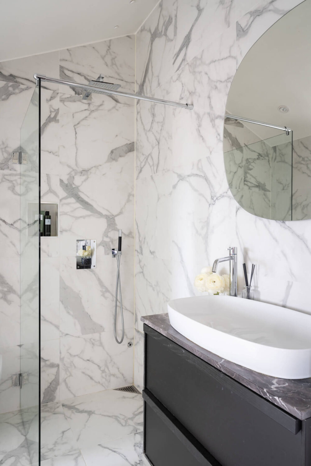 A Stylish Black and White Penthouse Apartment in Stockholm 17 marble bathroom black vanity
