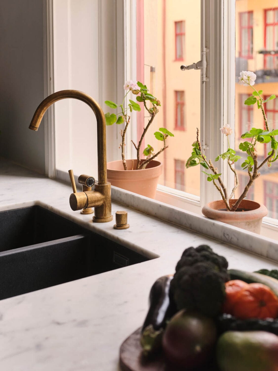 A Spacious Turn-of-the-Century Apartment with Nice Color Accents 13 marble countertop detail