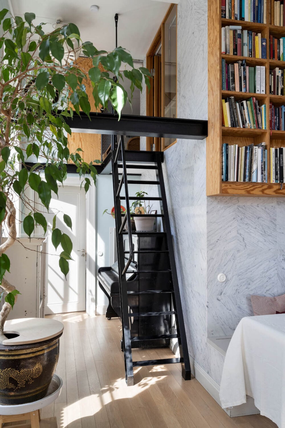 Pale Blue Walls and Huge Windows in a Swedish Loft Apartment 14 marble walls loft staircase