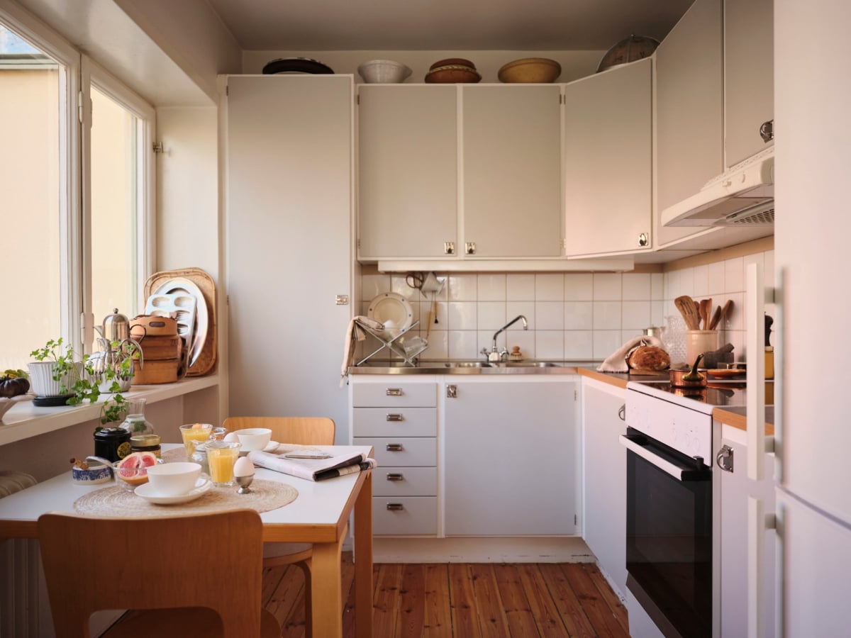 A Light-Filled Functionalist Apartment in Stockholm 9 midcentury kitchen