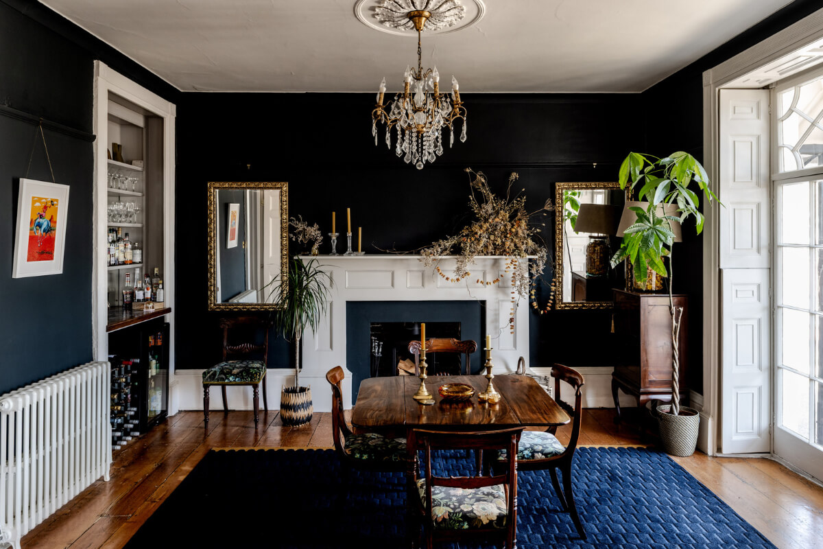 A Grand Georgian Home with Views of the Jurassic Coast 2 moody dining room large blue rug fireplace