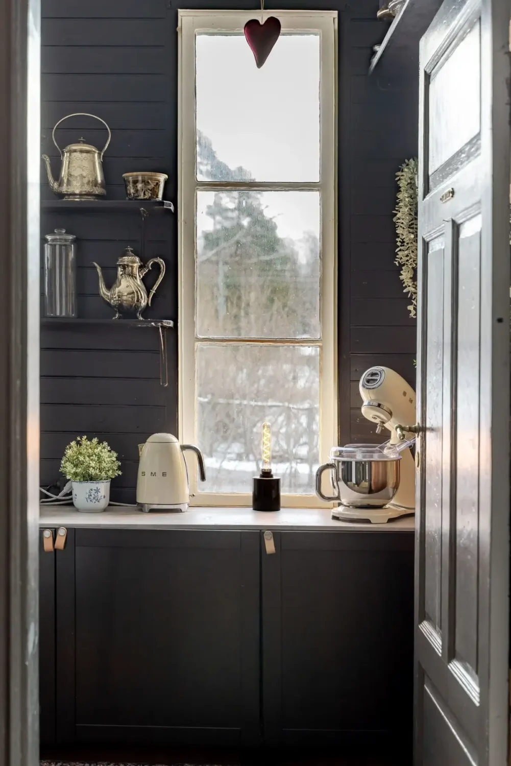 A Cozy Country House in Sweden Filled with Wallpapers 10 moody utility room