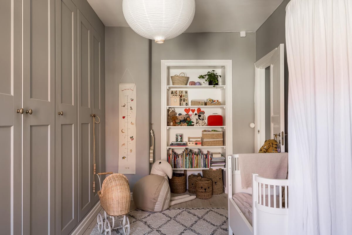 Gray Tones and a Classic Kitchen in a Swedish Apartment 24 nursery built-in wardrobes and built-in bookshelves