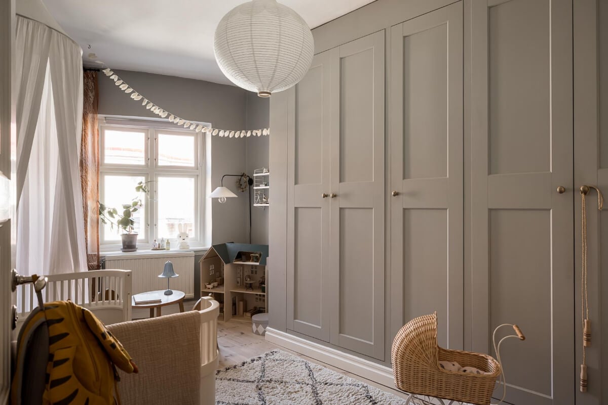 Gray Tones and a Classic Kitchen in a Swedish Apartment 22 nursery with built-in wardrobes