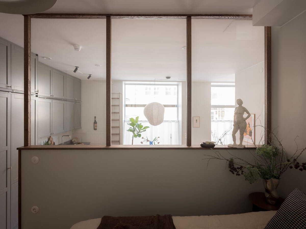 A Modern Split-Level Apartment in a Former Bakery 19 oak indoor window bedroom