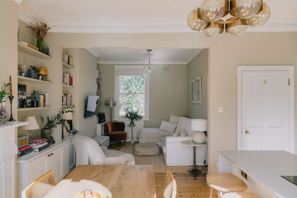 A Serene Color Palette and Built-In Shelves in a London Duplex 2 open-plan living room light colors wooden floorboards