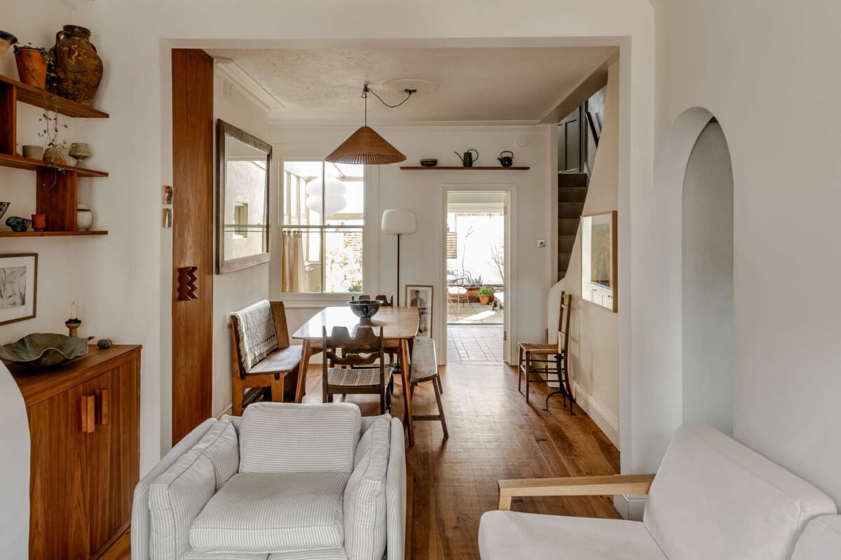 Reclaimed Materials and Custom Storage in a Serene London Home 4 open plan living space warm wooden elements