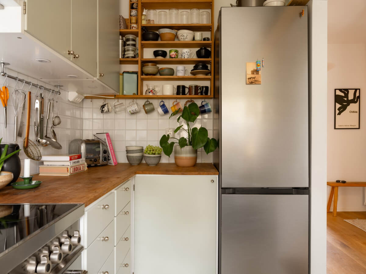 Small Space, Big Style: How to Design a Teeny-Tiny Kitchen That Works 33 open shelving small kitchen