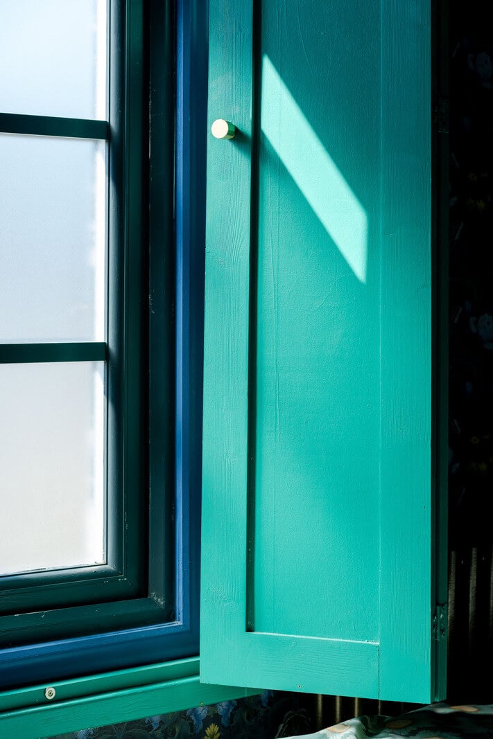 Colorful Design and Historic Features in a Charming English Home 10 painted shutters