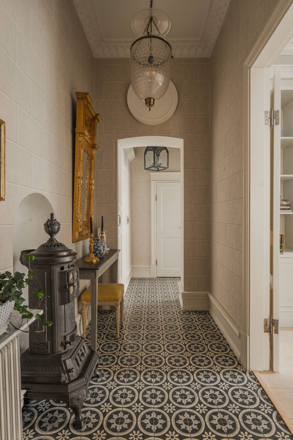 A Spectacular Kitchen and Antiques in a Late 19th-Century Apartment 30 patterned floor tiles wood burner hallway