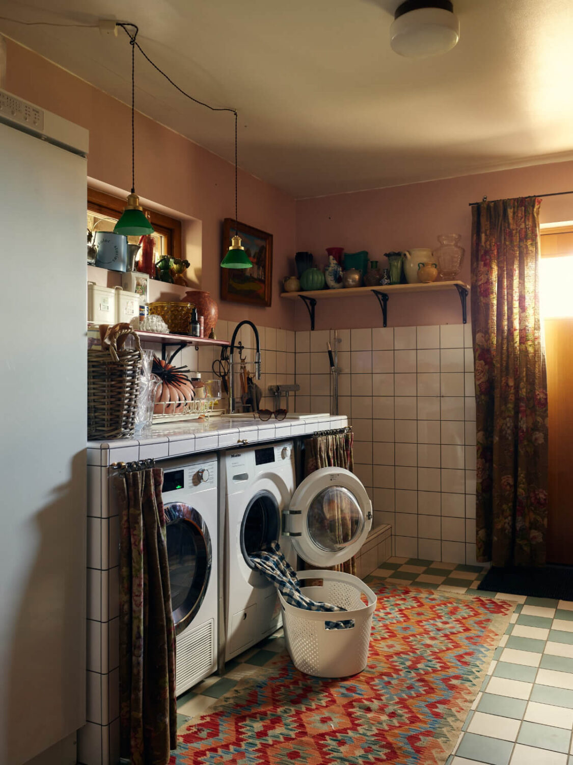 A Personal and Cozy 1960s Family Home in Sweden 35 pink utility room checkerboard floor