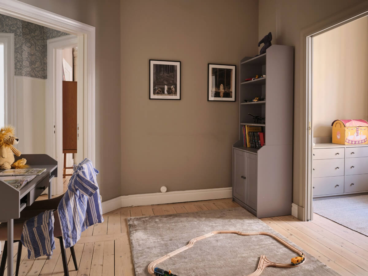 A Spacious Turn-of-the-Century Apartment with Nice Color Accents 27 play room with desk
